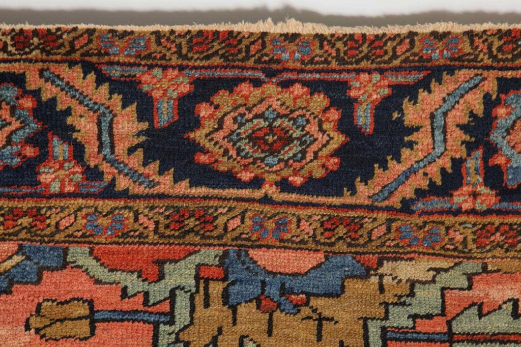 Antique Persian Bakshaish carpet top fringe detail photo