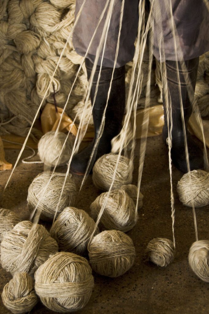 Yarn created with the traditional Persian drop hand spinning to produce the finest organic raw materials for Persian rugs