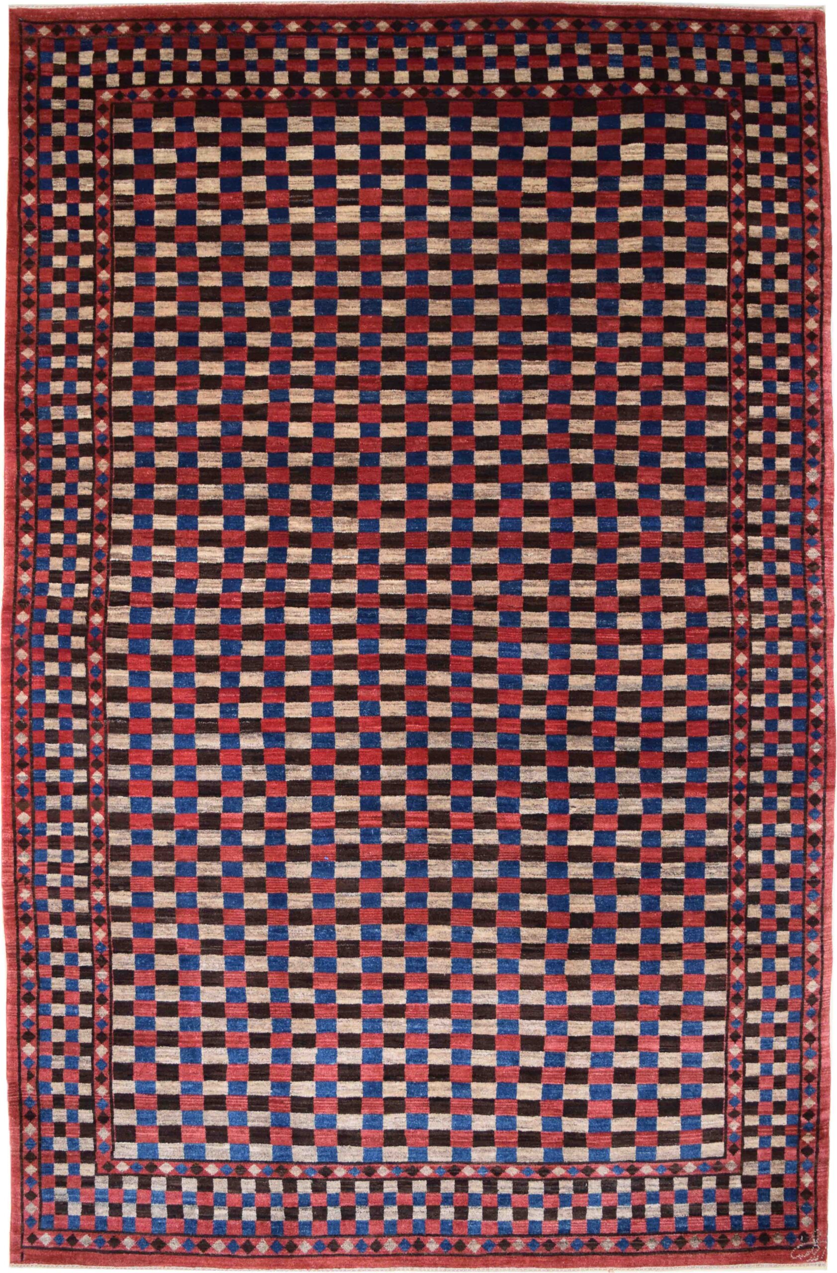 Red, Indigo, and brown checkered wool Persian carpet. This carpet is hand knotted, durable, and comfortable and measures five feet eight inches by eight feet ten inches.