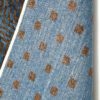 Luxurious handwoven wool carpet from Persian Fat Tailed Sheep in rich brown on blue background from organic vegetable dyes