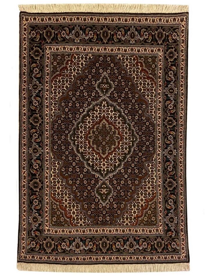 Hand-knotted Persian rug with intricate floral medallion design in brown, ivory, taupe, and espresso wool tones.