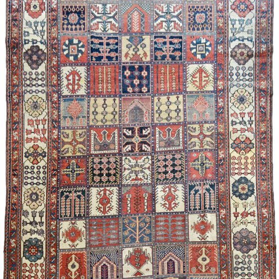 Our example Bakhtiari is unique and was created by the master weaver, Ardal. Renowned across Persia for his line of Bakhtiari carpets, Ardal pieces are sought after for their extraordinary craftsmanship and their limited production (1870-1900). In much the same way that Orley Shabahang creates carpets by hand to this day, Ardal utilized the finest raw materials and weavers to create Char Mahal’s most exemplary Bakhtiari pieces. Like other traditional Bakhtiaris, the example carpet has a panel-style pattern and incorporates the classic Bakhtiari motifs of weeping willows, butterflies, caterpillars, and a large assortment of flowers. However, this Ardal carpet differs from other Bakhtiari by its uncommon combination of wool tones and the weave. Notice that the Ardal design is more refined, and the field and border motifs have a great deal more clarity. Additionally, this border uses large open-faced flowers that are interconnected throughout the carpet by vines and bouquets. 