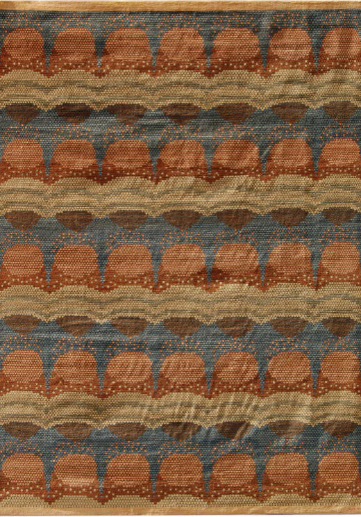 Warm red, pink and blue abstract Persian carpet featuring a circular interior pattern, measuring 9' x 12.' Hand knotted in organic wool.